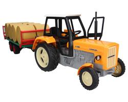 Traktor zabawkowy Ursus C-360 żółty + przyczepa do wywozu balotów Bruder